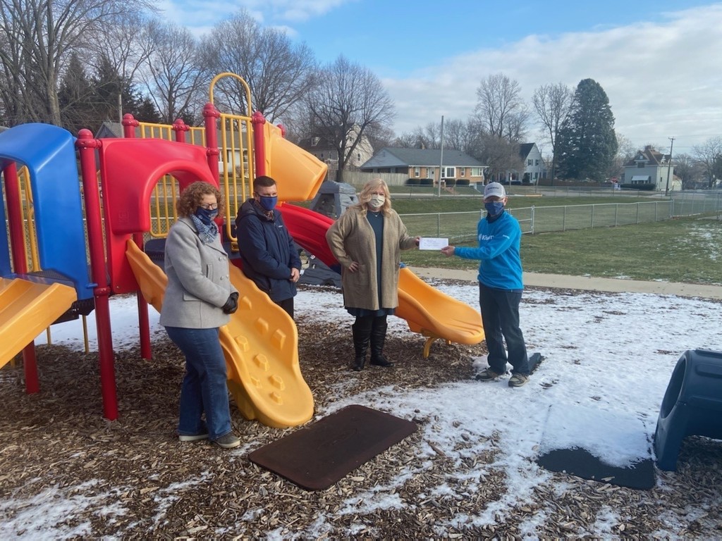 photo of people with playground equipment