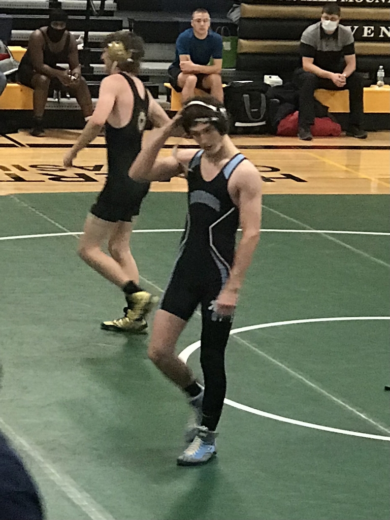 Conner Hayes walks off the mat victorious. Hayes and Kaedin Juhl were unbeaten at Maur Hill tonight. 