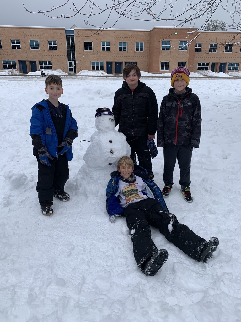  male students next to snow creatures