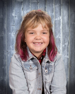 Madelyn was chosen as Student of the Month. Her teacher, Miss Stalberger says, “I LOVE having Madelyn in class this year! Her enthusiasm and energy for life and learning is absolutely contagious! I love watching her reactions and expressions during storytime and lessons. She gives 110% with everything that she does and never gives up! We are so incredibly lucky to have her in 1st grade this year!” Madelyn is most proud of herself for being student of the month. She is most thankful for her teacher, Miss Stalberger. Madelyn shares that Miss S is super kind to her. Madelyn loves doing her homework at home, especially writing her letters. Way to go, Madelyn! We are so proud of you!!
