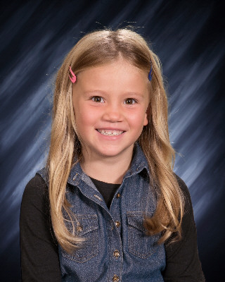 Katie was chosen as Student of the Month. Her teacher, Miss Ring says, “Katie is full of joy and wonderful in every way! She is kind, very smart, brave, creative, and she can make anyone smile and laugh! She is also an outstanding student. Katie does an amazing job on all of her assignments and she attends and participates in our Google Meets. Katie always brings out the best in others and she is so fun to be around. I am so grateful to have Katie as part of my class this year. Congratulations, Katie! Keep shining your light and being YOU!” Katie is most proud that she gets to go back to school full time. Katie likes doing math and reading the most in school. Katie is most thankful for food. She likes pizza and tacos the most. Katie likes to play with her cousins when she is at home. They like to play dress up and be princesses or unicorns! Katie, you are kind, thoughtful, and smart! We love you at Ogema Elementary!