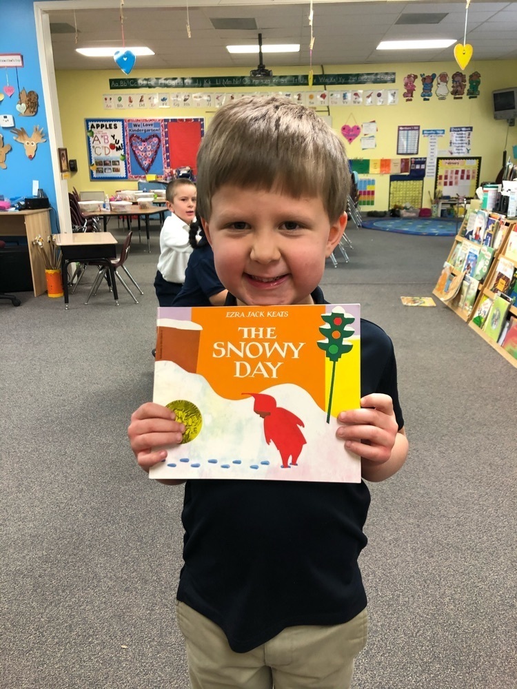 Student holding book