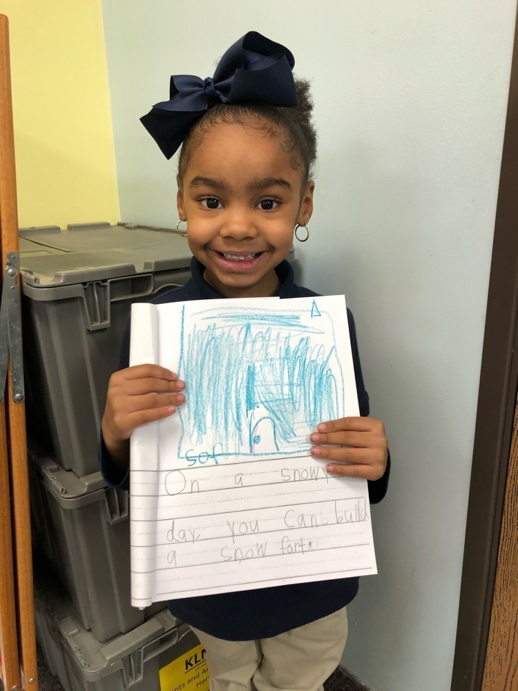 student holding paper