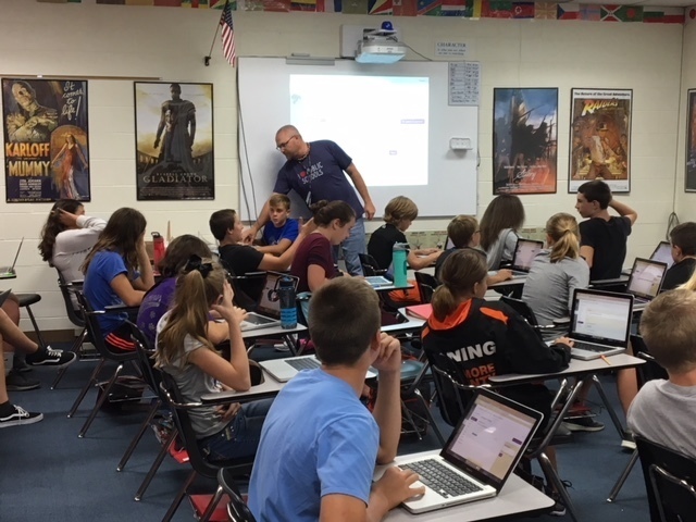 7th grade students doing their lesson using Canvas. 