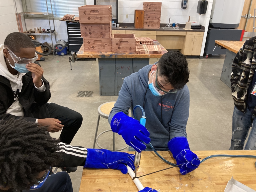 Plastic welding in manufacturing class.