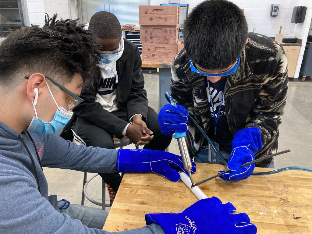 Plastic welding in manufacturing class. 