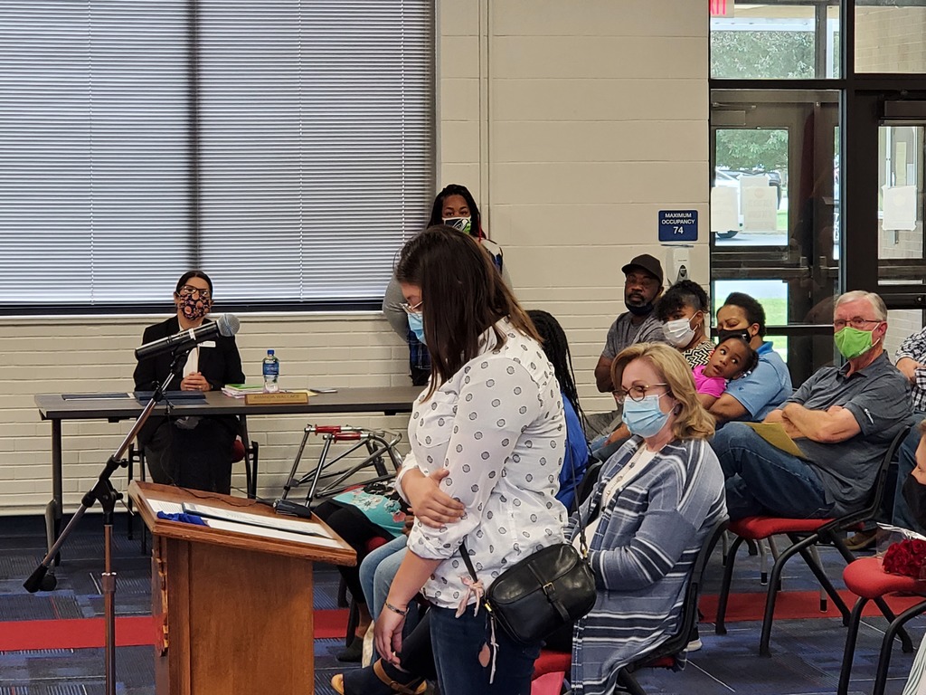 Natalli reading her poem