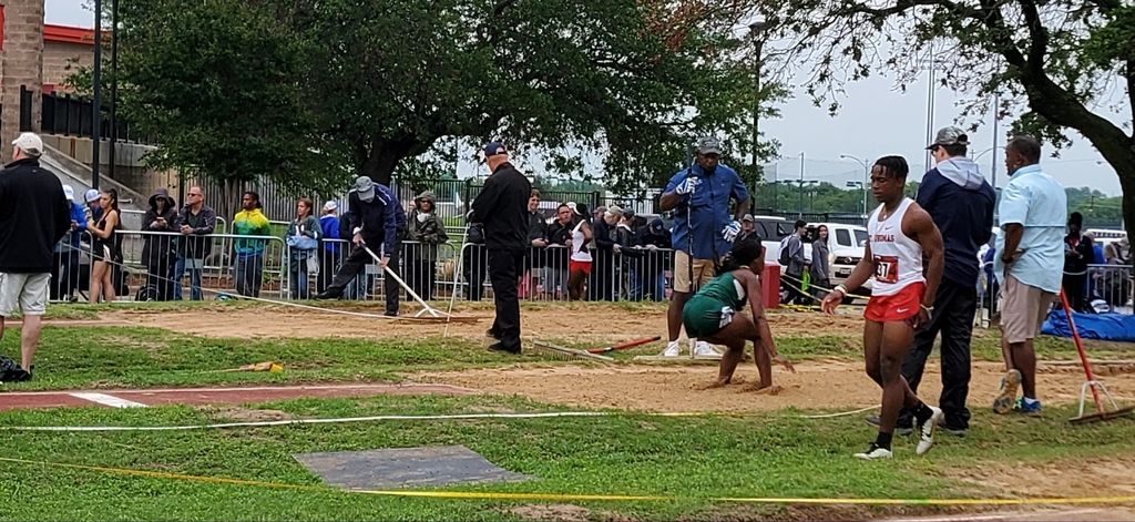 Christine competing at State in Triple Jump