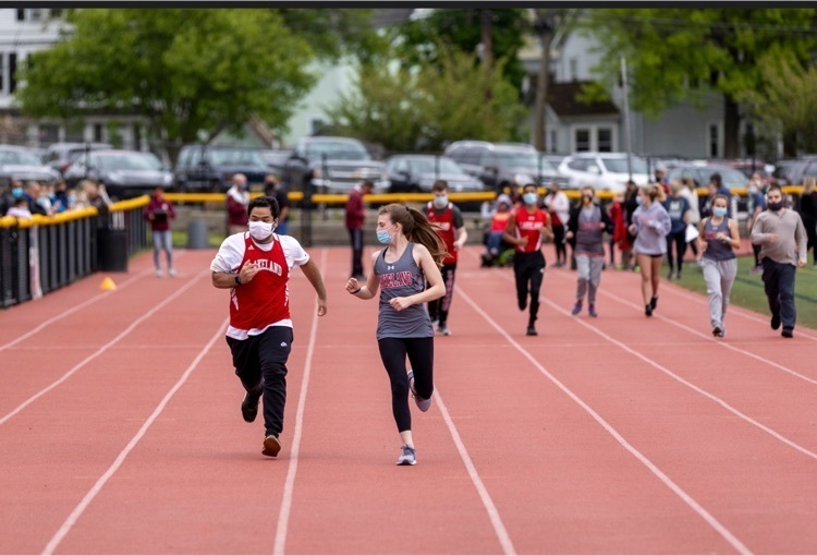 One of our athletes and unified partner running a relay!