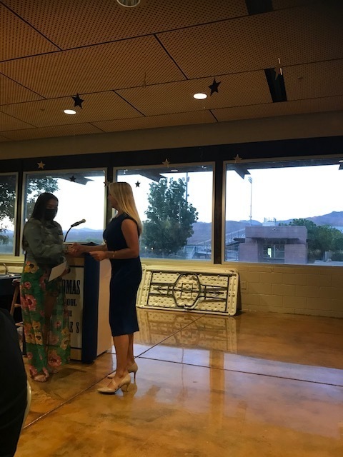 Kylie Olivar receiving an EAC Scholarship