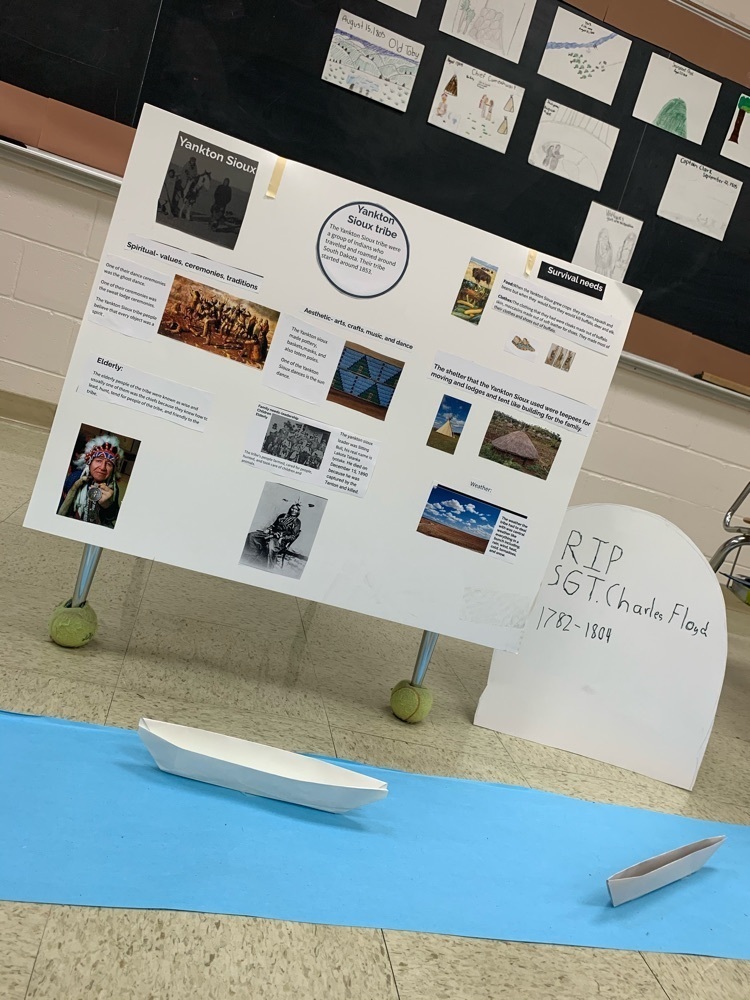  One of the Native American posters, Sargent Floyd’s tombstone, and the origami boats student got to built as a part of the project.