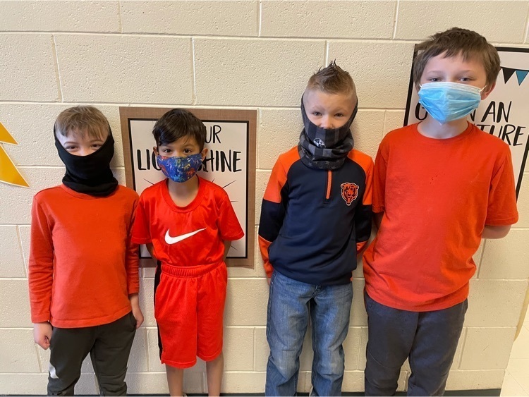 students wearing orange