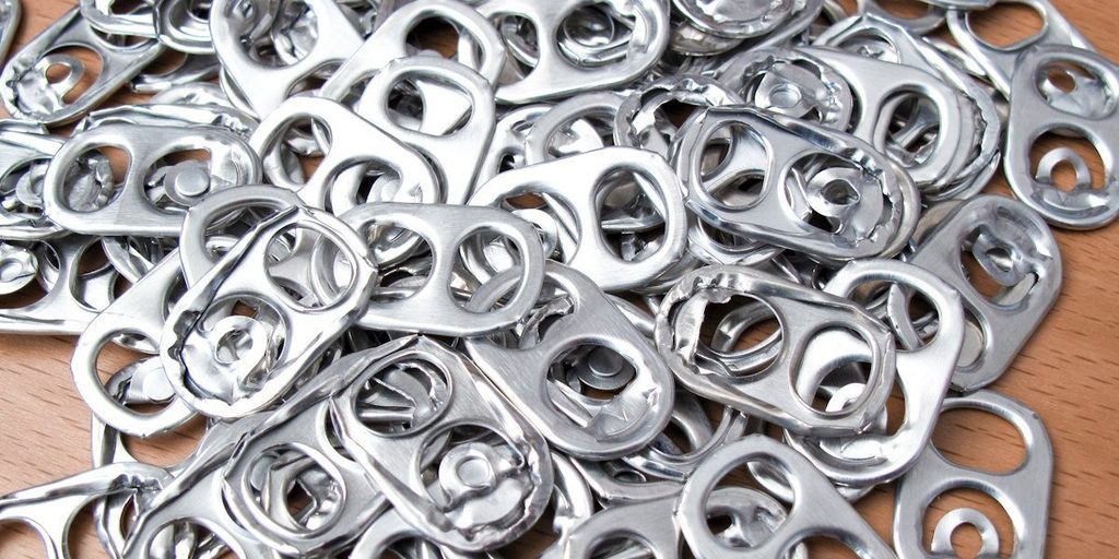 A pile of pop can pull tabs