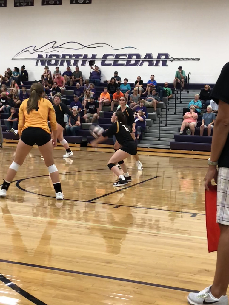 Amber Swart makes the pass to setter Caitlyn Riggan