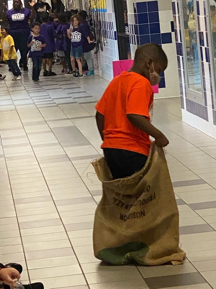 student in sack rac