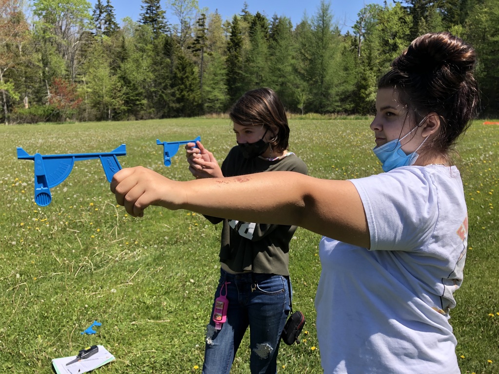 Measuring the angle between the ground and the rocket.
