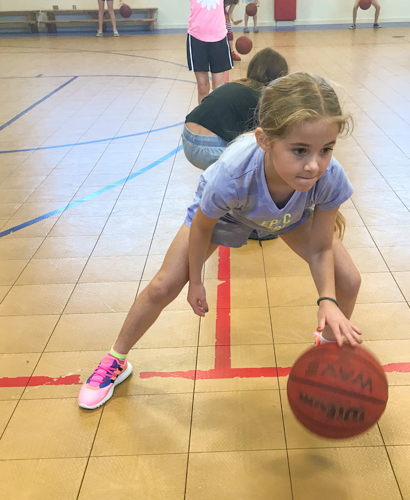 Girl playing basketball