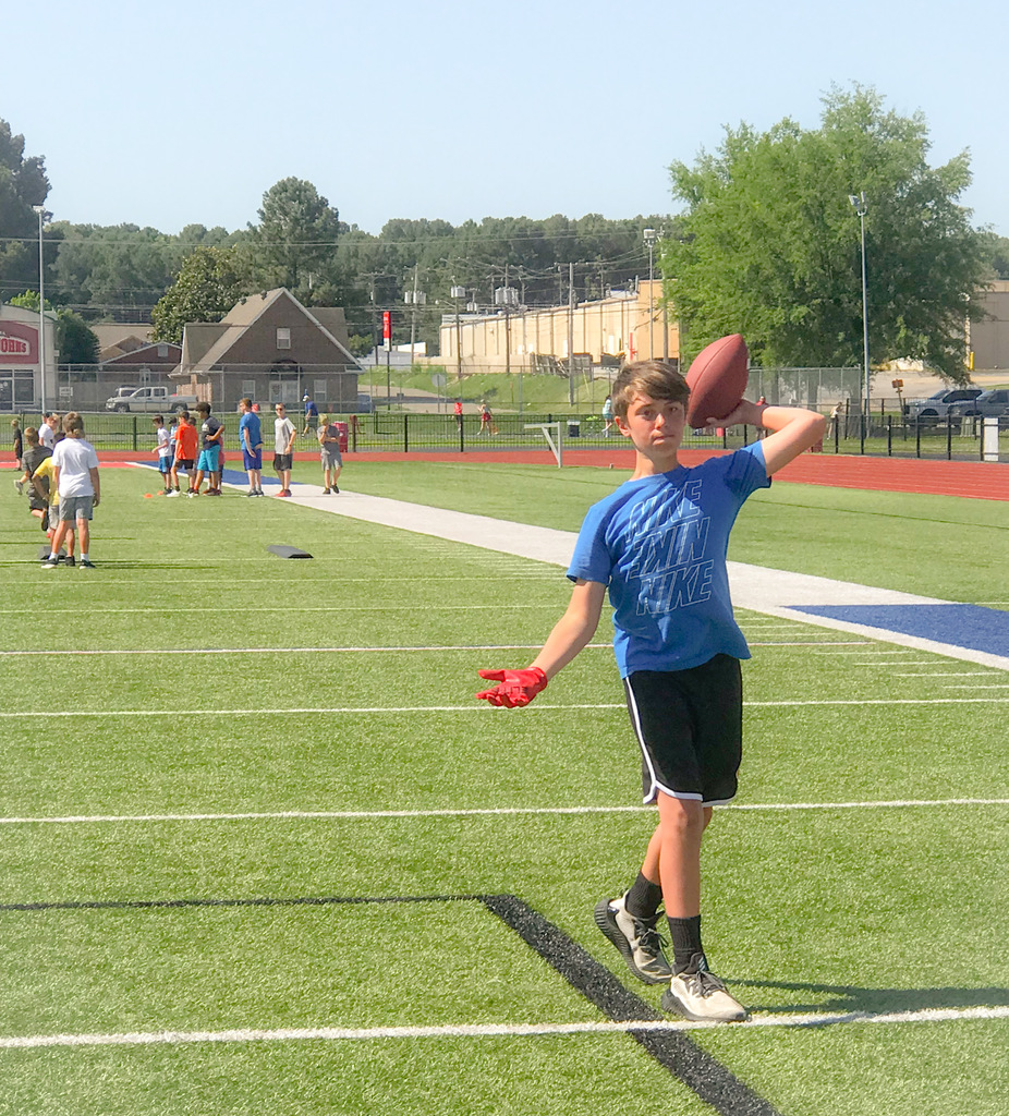 Boy throwing a football