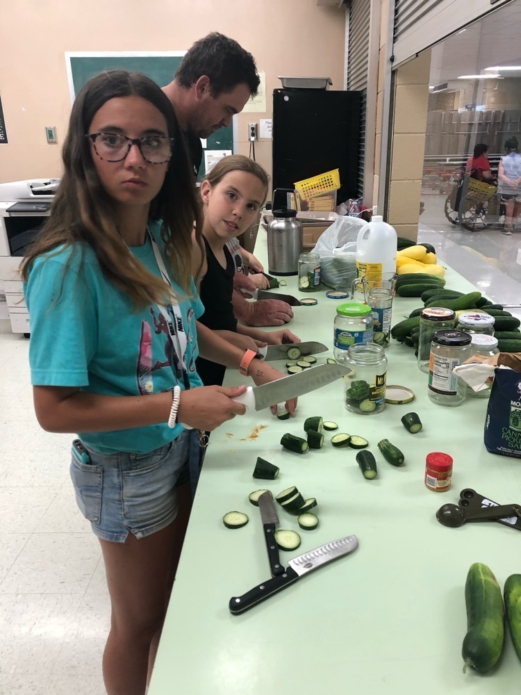This group is learning how to make their own pickles thanks to Mr.Riordan and his mother.