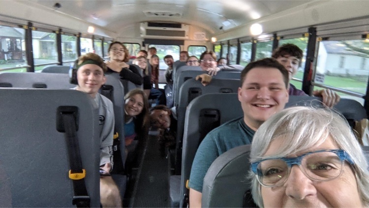 kids sitting on a bus