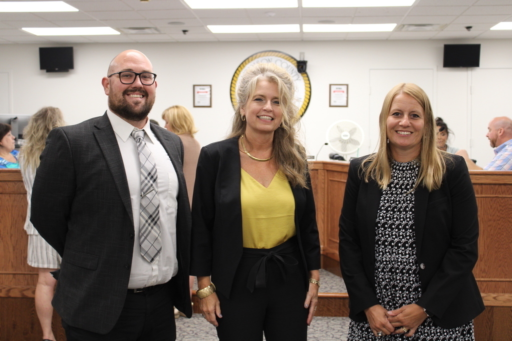 Dora Stutler welcomes Susan Miller and Donnie Powell