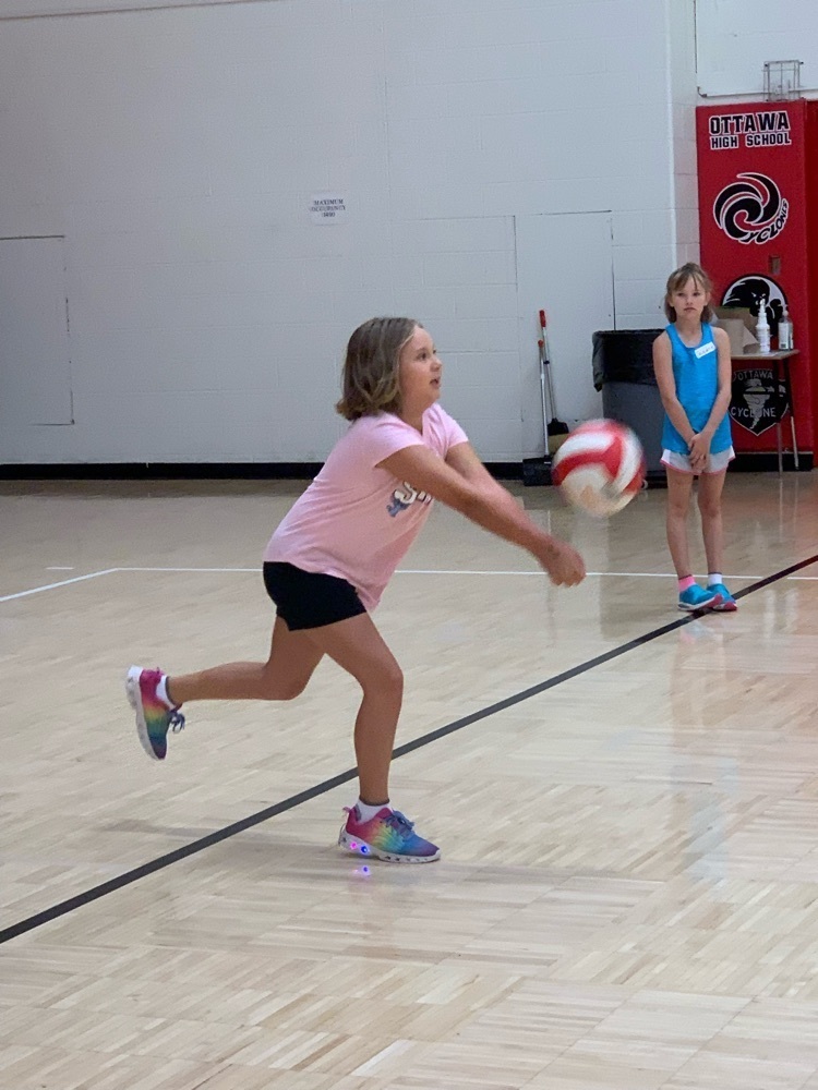 girls playing volleyball 