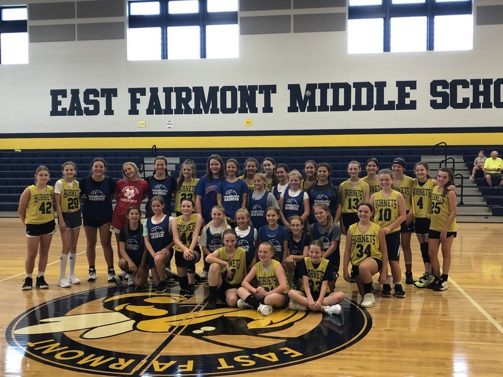 East Fairmont Middle and Tridelphia players pose for a picture after the scrimmage