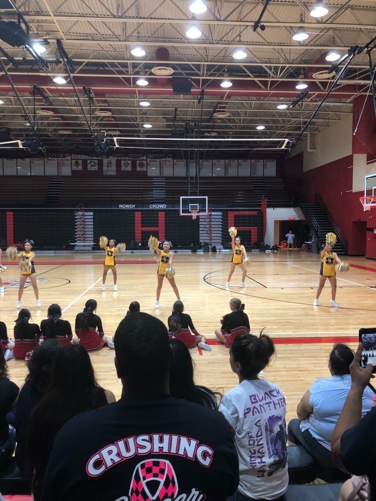 Cheer showing off their talent!