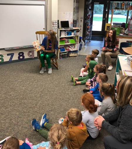 Kate Cavanagh reads to Mrs. Danner's PreK class