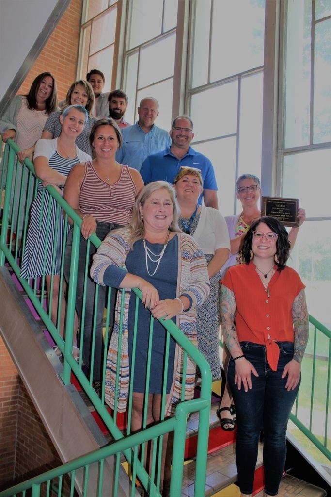 RHS staff posing for picture with their MEAO award