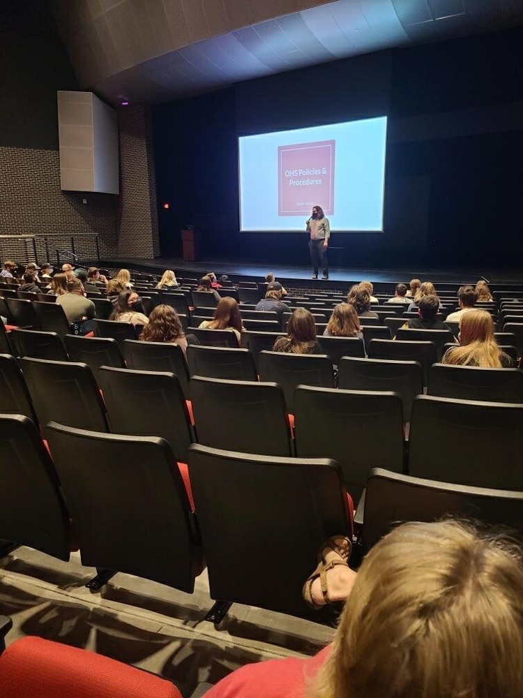 students in the PAC listening to a presentation 