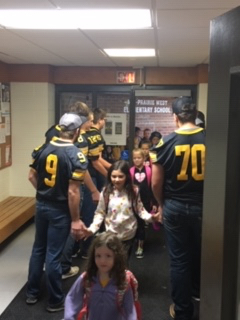 Football team greeters at West Elementary