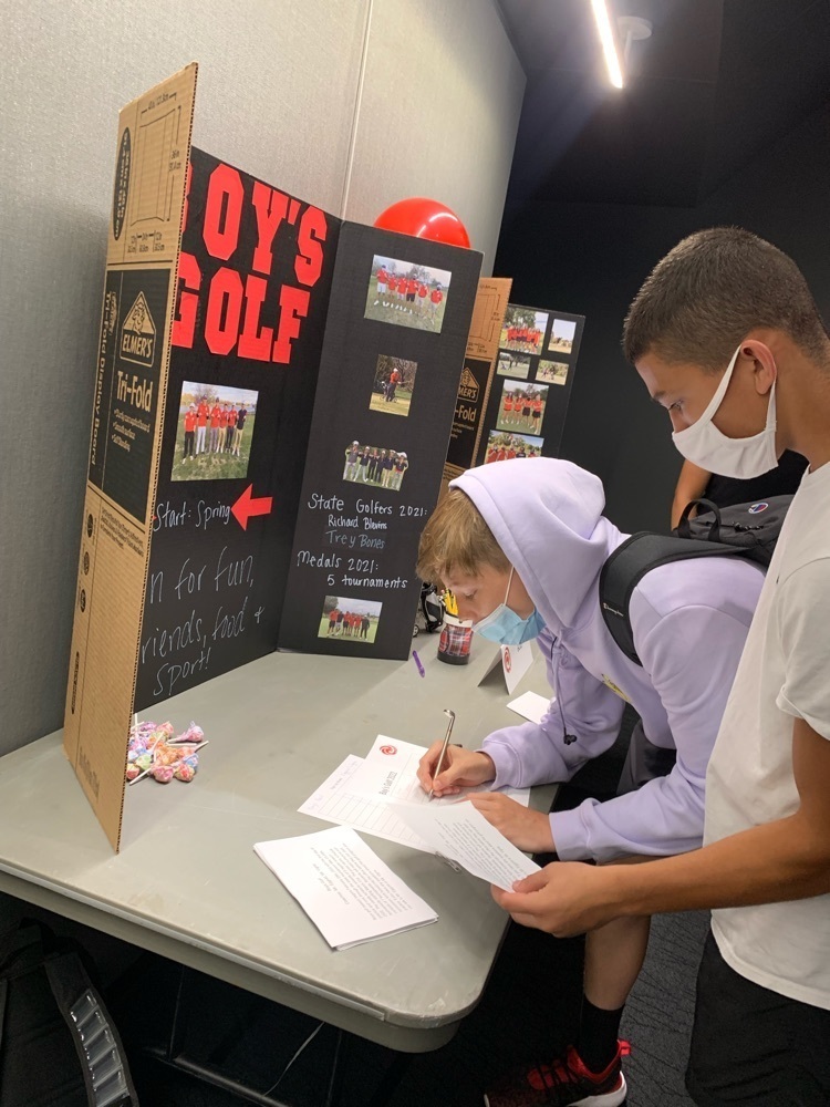 student signing up for an activity 