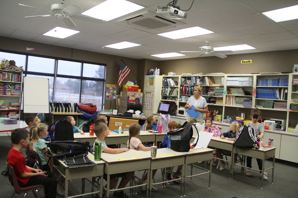 Mrs. Trum's 1st grade class getting their stuff ready.