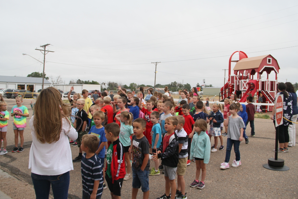 Mrs. Davis getting the K-12  kids attention.