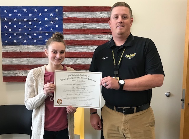 This past summer Olivia represented Mid-Prairie High School and the State of Iowa at the Congress of Future Medical Leaders in Boston, Massachusetts.  Olivia learned from some of the greatest living minds in medicine.  Mr. Strickland, MPHS principal, presented Olivia with her official award of excellence.  Congrats!