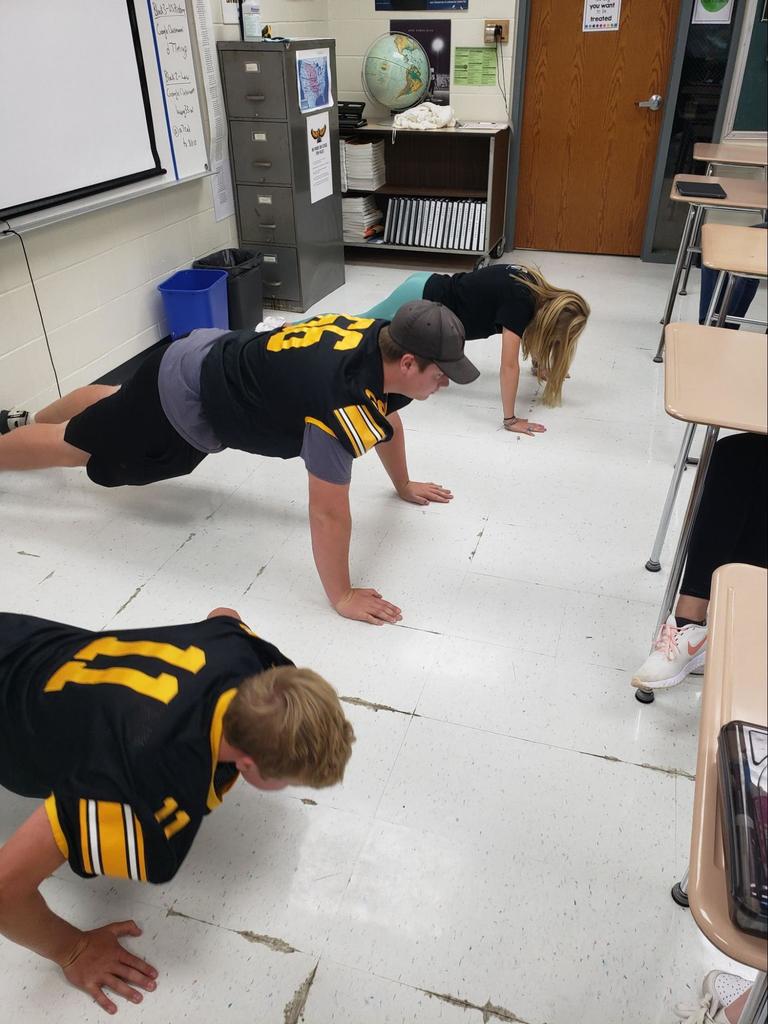 Students doing push ups