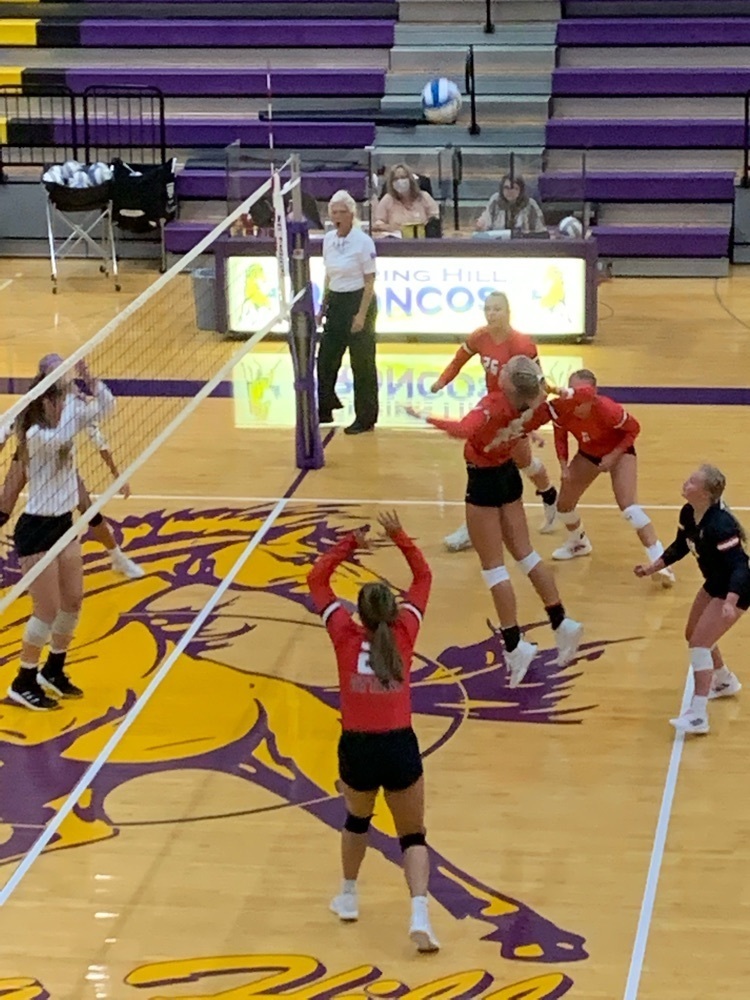 girls playing volleyball 
