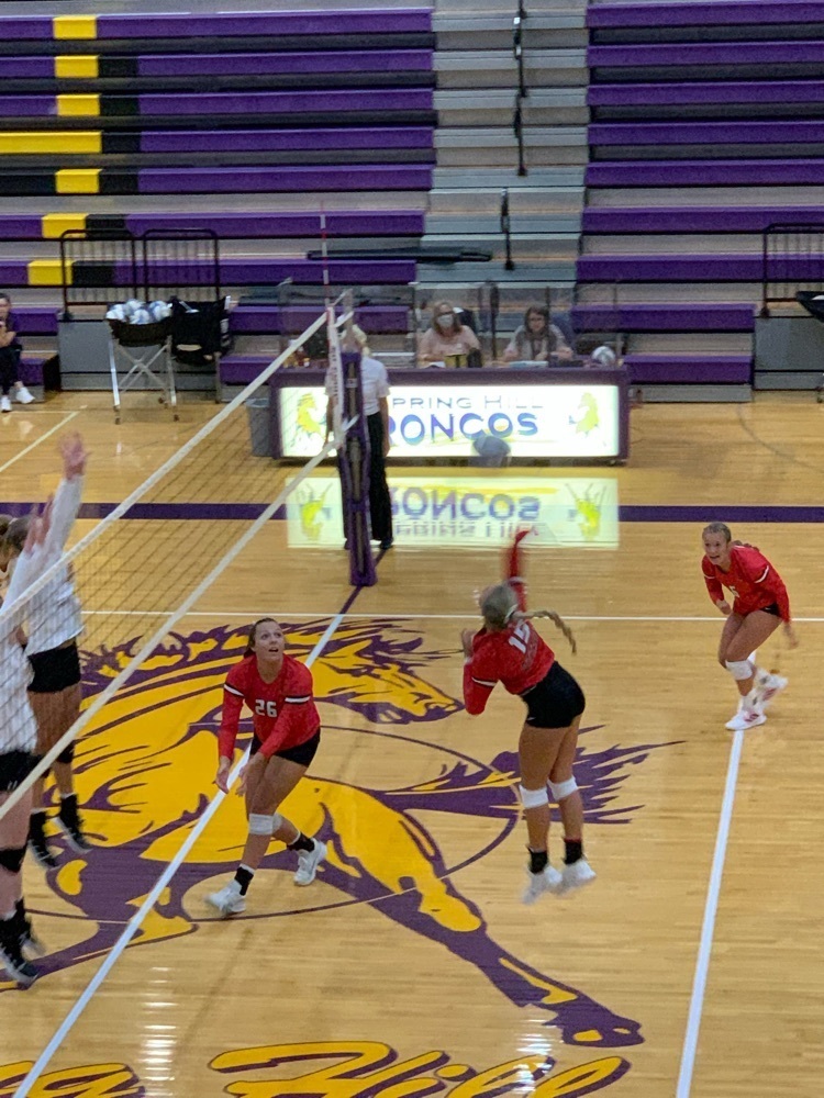 girls playing volleyball 