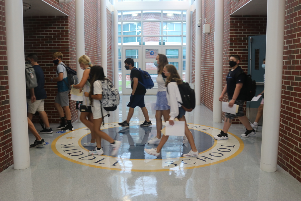 students walking in hallway