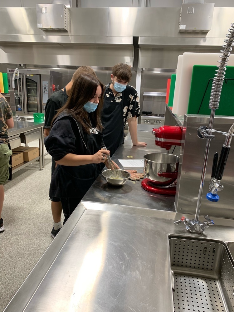 students preparing food