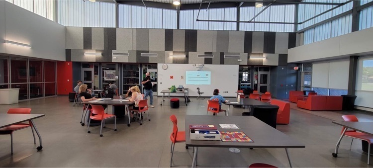 students sitting at tables 