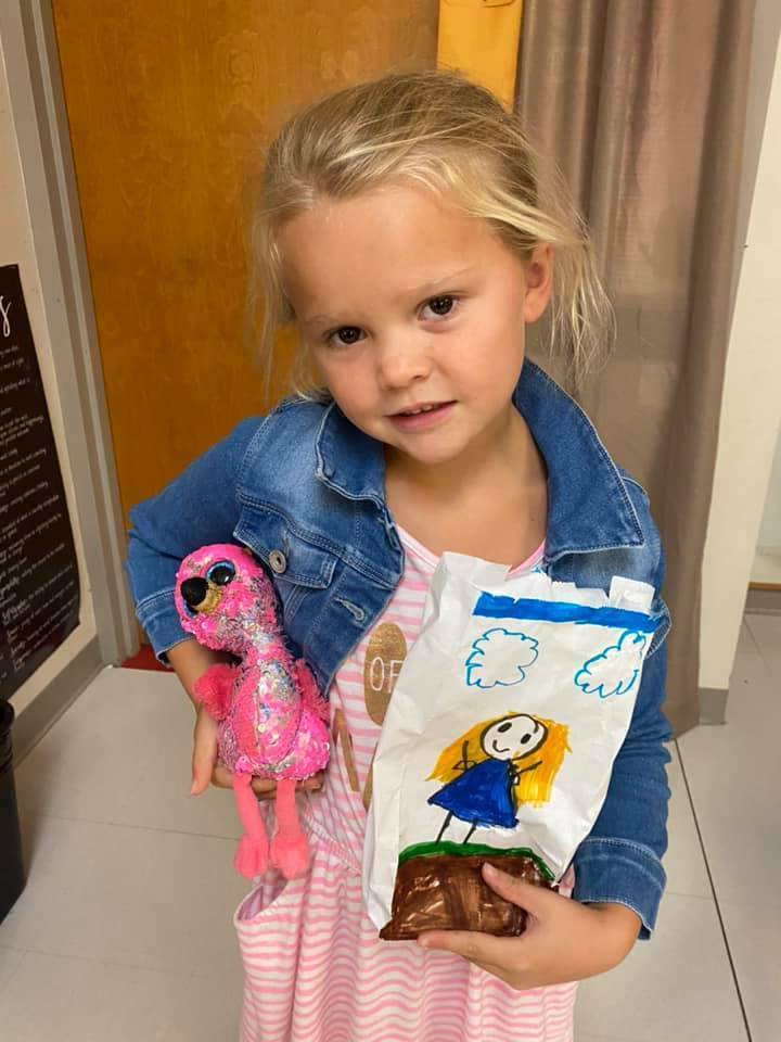 student with stuffed animal