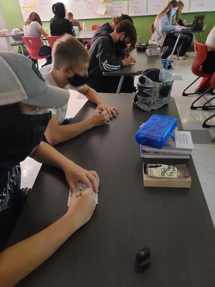 students working at a desk