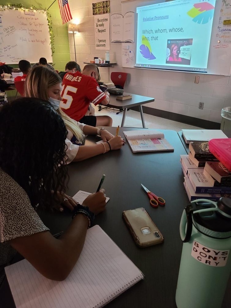 students working at a desk