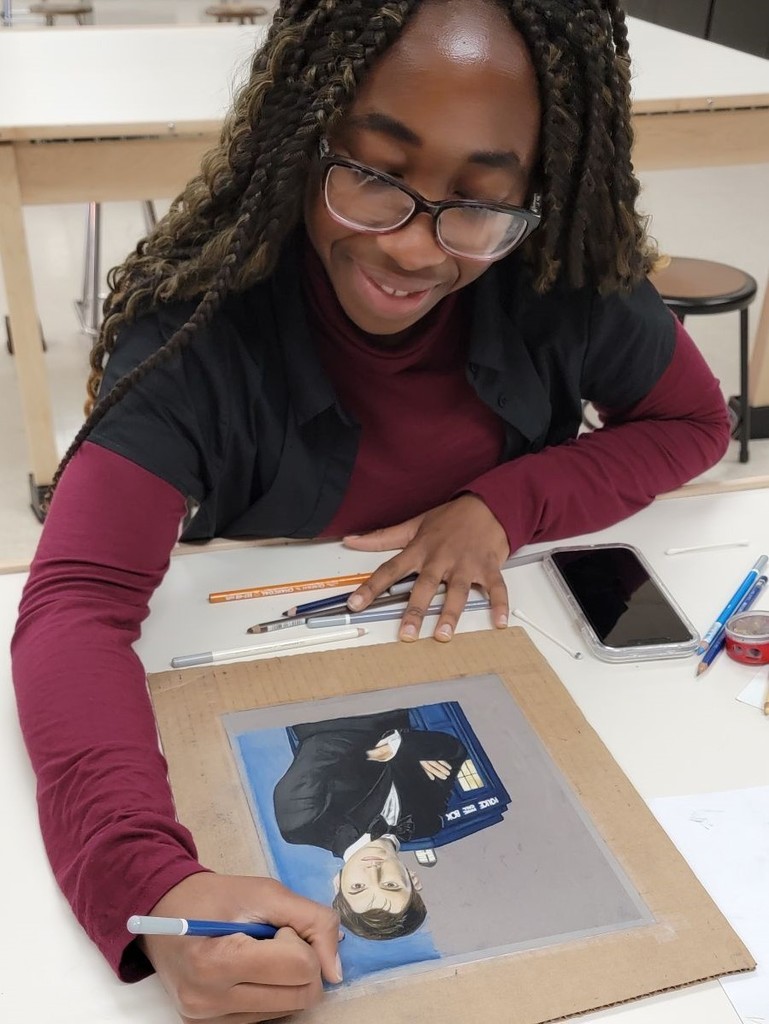 Student working on a portrait