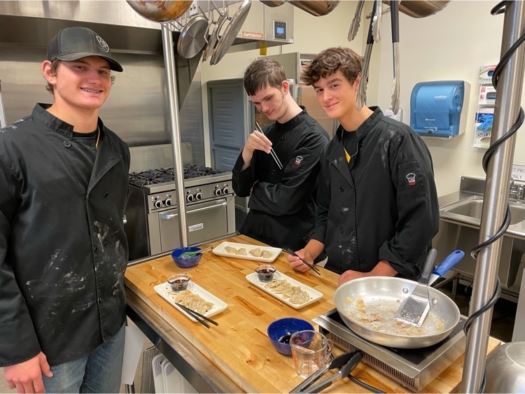 students with dumplings