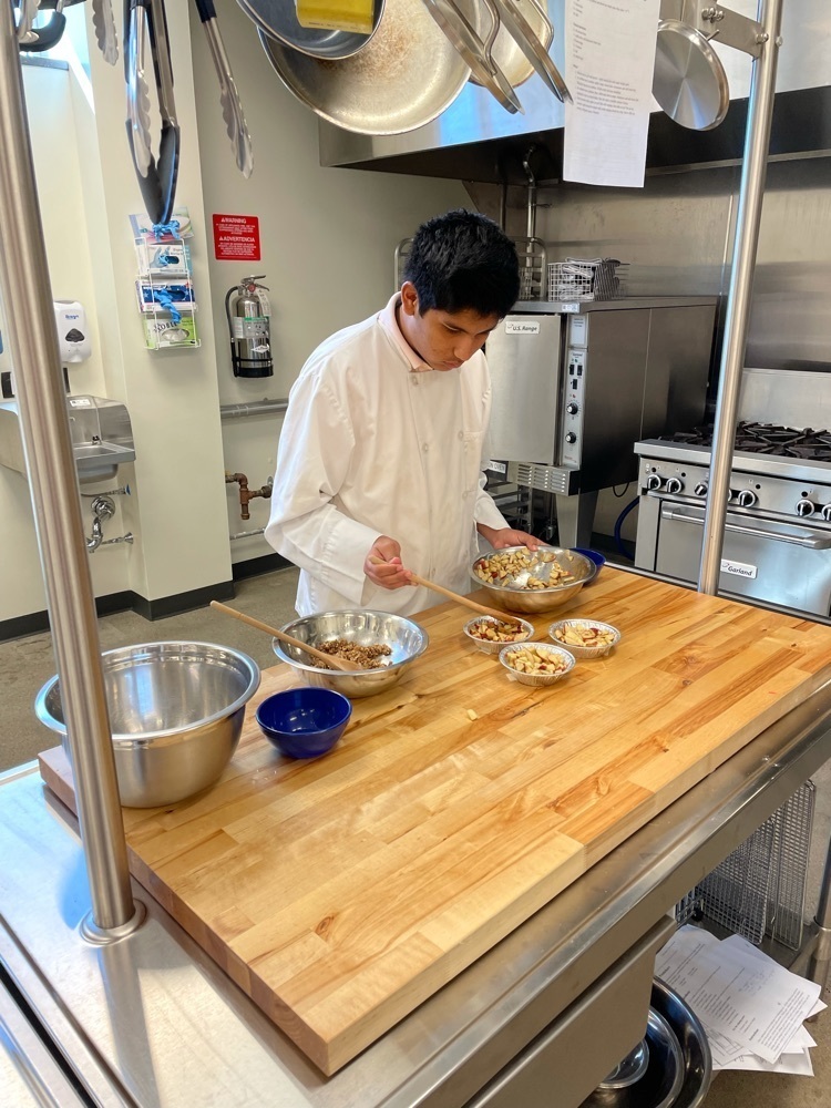 student making apple crisp