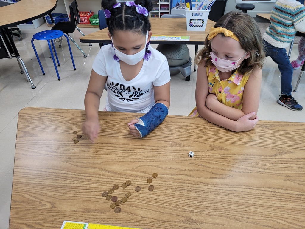 Students Doing Math with Pennies