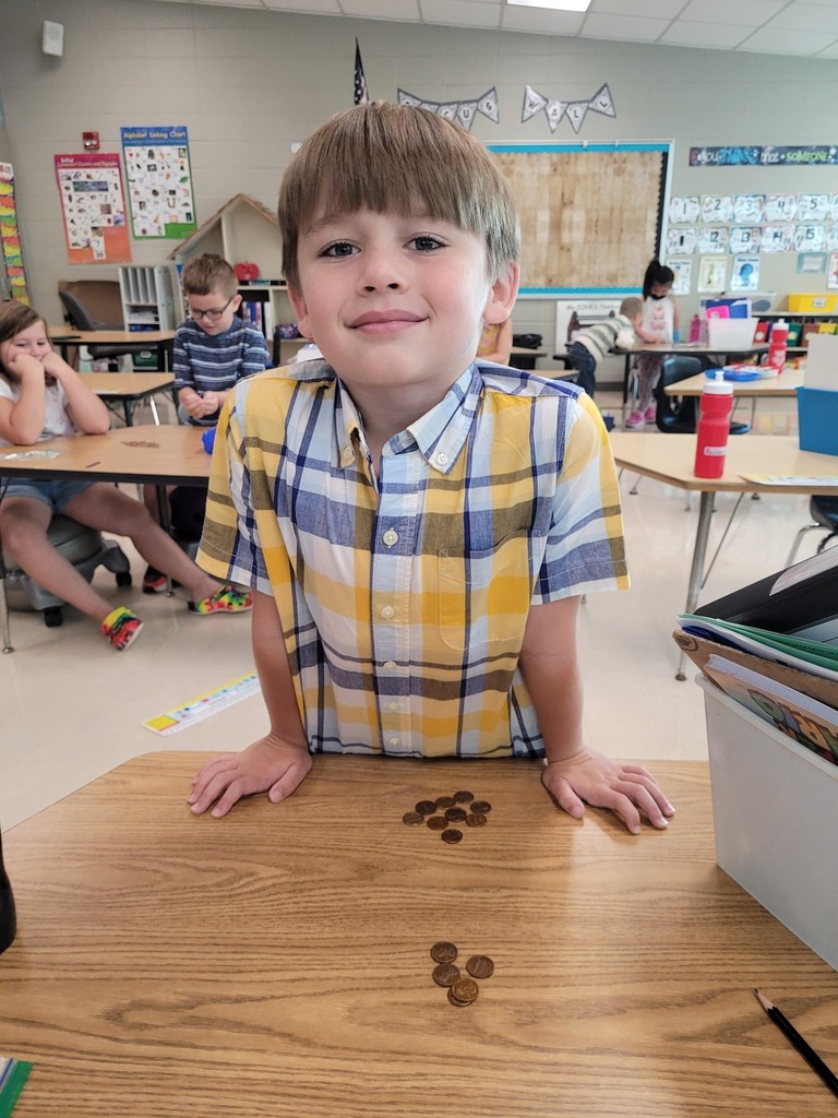 Students Doing Math with Pennies